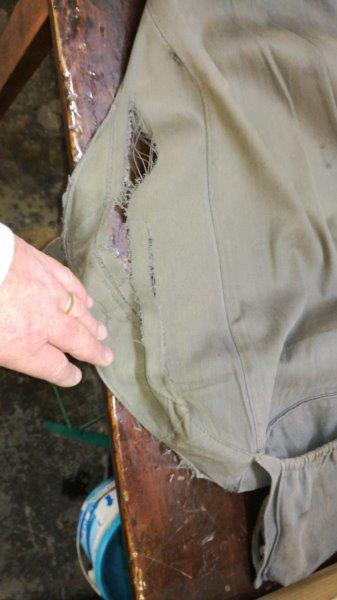 26. torn seat cover.jpg