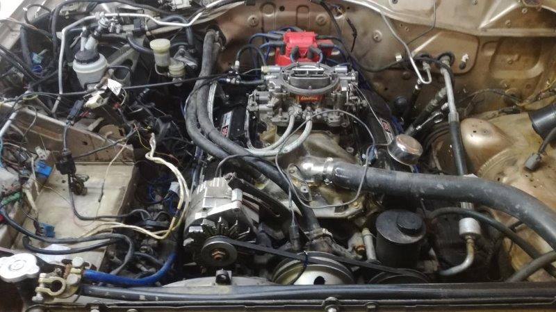 8. engine bay After a day of stripping.jpg