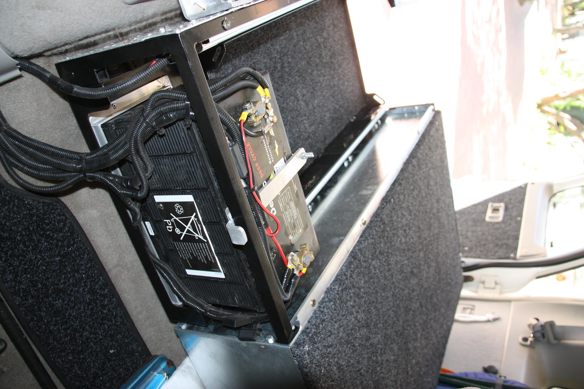 2nd battery nicely tucked in behind fridge.