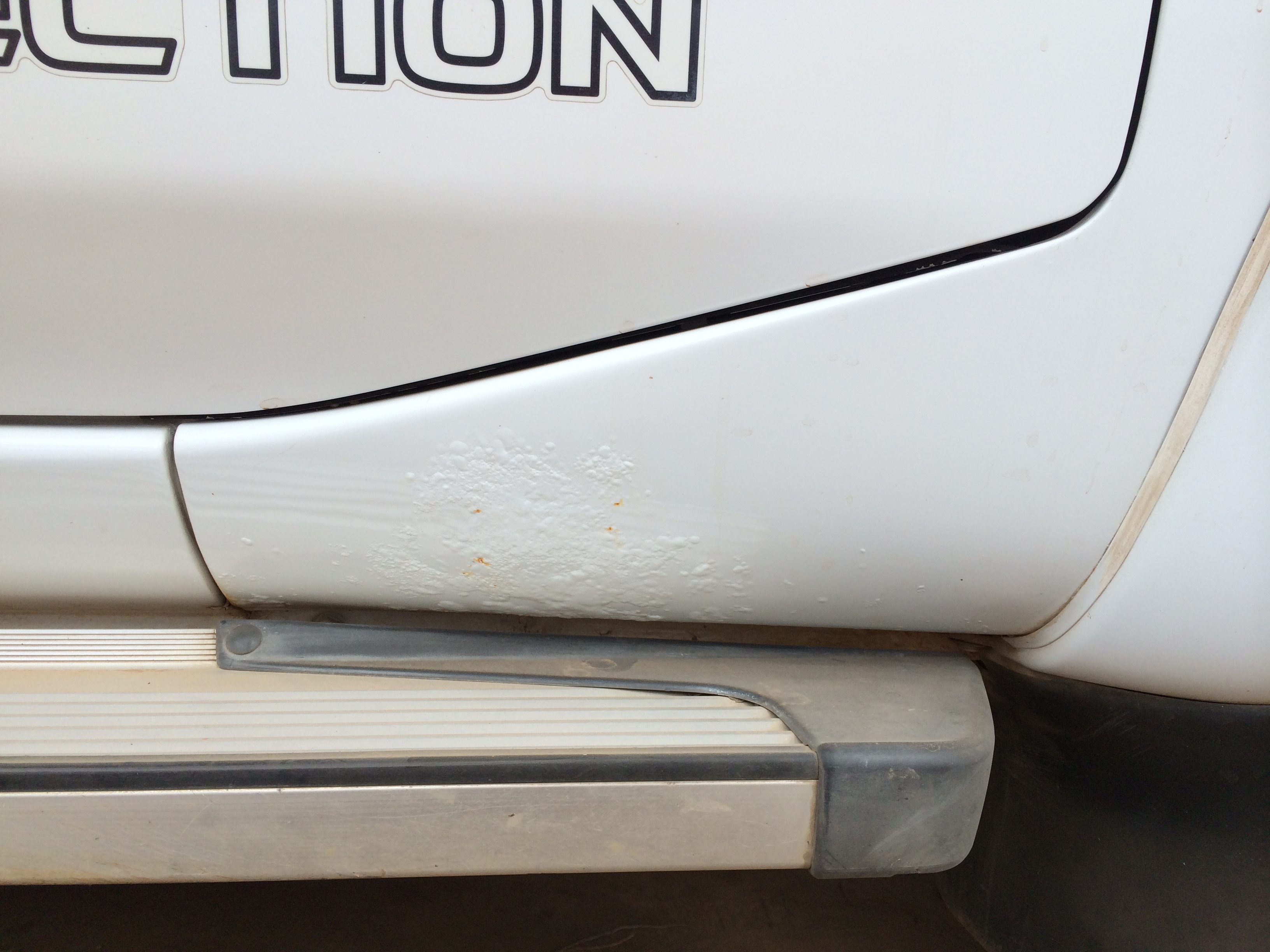 driver's door right lower area