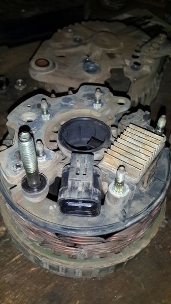 Hitachi Alternator showing diodes and rectifiers from top/side